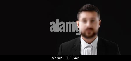Anonymous man with pixelated face on black background Stock Photo