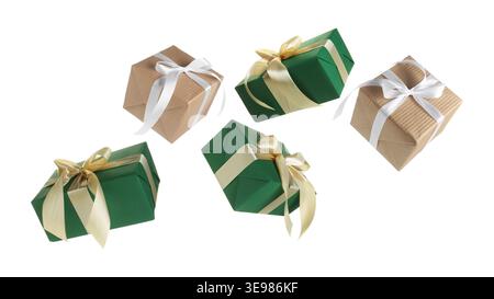 Gift boxes flying in air against white background Stock Photo