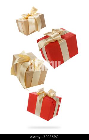 Gift boxes flying in air against white background Stock Photo