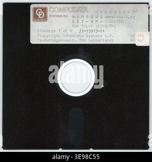 This archival scan represents a diskette used for installing Windows 1.xx, the inaugural version of Microsoft’s operating system, released in 1985. Stock Photo