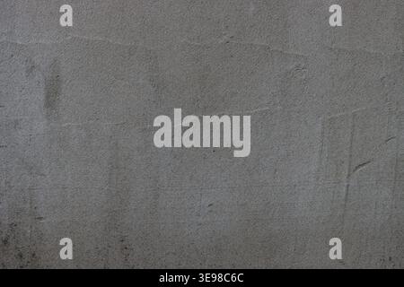 Slightly weathered surface shows signs of age and use. Neutral tone suits minimalist design or urban backgrounds. Ideal for architectural Stock Photo