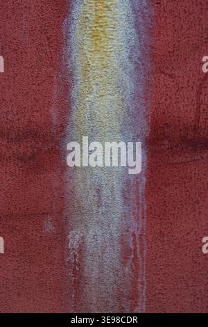Soft gradient blends from pale yellow to grey. Rough fabric background shows subtle wear and crease Stock Photo