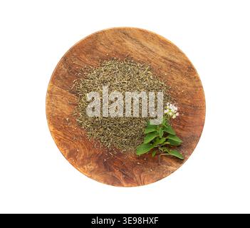 Dry thyme isolated, dried marjoram, oregano pile, ground crushed thyme seasoning, thyme leaves, rosemary herbs and spices on white background top view Stock Photo