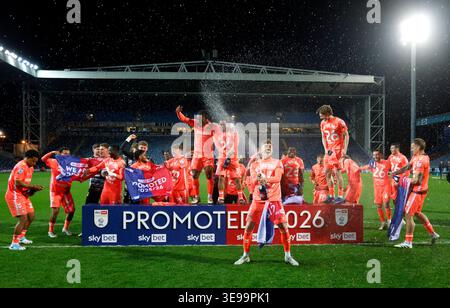 Coventry City players celebrate promotion following the Blackburn ...
