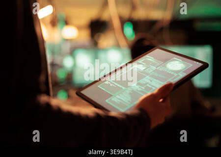 Access granted message on digital tablet screen, successful password cracking, database hacking. Cyberattack, internet thieves stealing electronic information, using malicious software Stock Photo