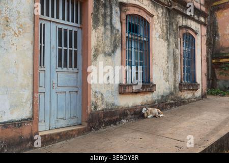 Old dilapidated building of colonial Portuguese architecture in Bolama town on Bolama Island, Bijagos Archipelago, Guinea Bissau. Stock Photo