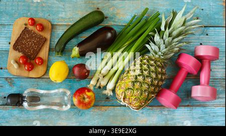 Concept of health,vegan diet,health care, concept,Healthy food,Dumbbell, flat lay Stock Photo