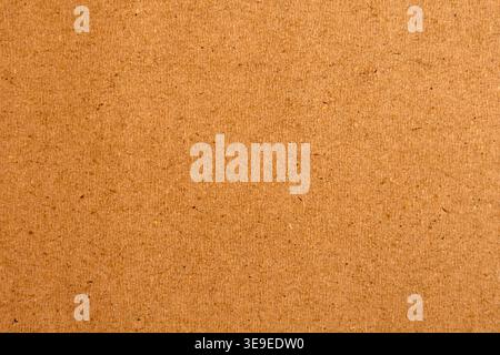 Textured brown kraft paper surface with recycled cardboard fiber details Stock Photo