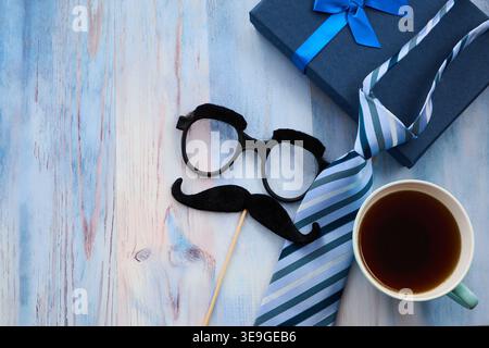 Father's day concept with gift, tie, and coffee Stock Photo