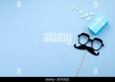 Father's day blue gift box and mustache prop Stock Photo
