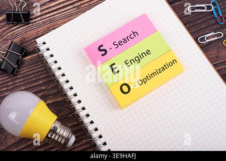 SEO (Search Engine Optimization) text on colorful note business concept Stock Photo