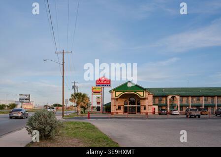 Wide shot of U.S.87 and Ramada Limited motel and roadside businesses, San Angelo, Texas, USA. Stock Photo
