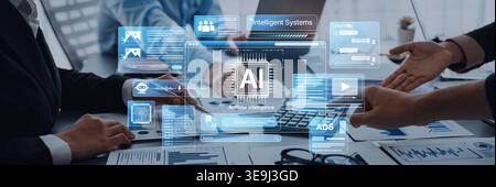 A team of professionals collaborates on an artificial intelligence project, utilizing digital interfaces and data analytics in a modern office setup Stock Photo