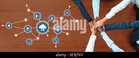 A visual representation of collaborative computing featuring diverse hands united over a network diagram with cloud elements, symbolizing teamwork and Stock Photo