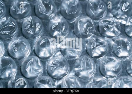 Close up of transparent bubble wrap background with soft light reflections Stock Photo