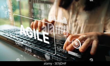User Engaging in Agile Workflow with Digital Interface and Data Visualization on Laptop Keyboard. Asymptotic smart data analytic. Stock Photo