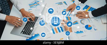 Business Analysis with Data Visualization and Collaboration in a Professional Environment Featuring Charts, Laptops, and Graphs. Amity Stock Photo