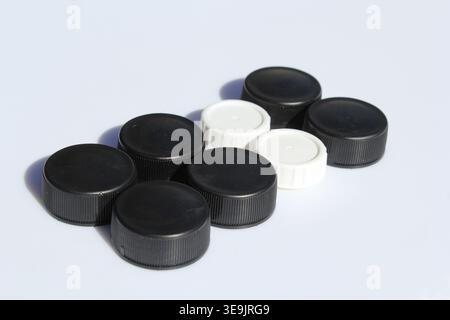 Plastic bottle caps on a white background Stock Photo