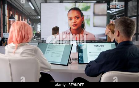 Job Candidate Attentively Answering Questions During Important Virtual Interview Call. Stock Photo