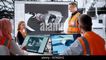 Aerospace Engineer Is Giving Presentation On 3D Aircraft Design Software. Stock Photo