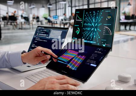 Latinx Engineer Focused On AI Model Development And Big Data Clustering For Enhanced Predictive Analytics Stock Photo