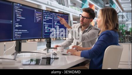 Tech Professional Programming On Computer To Innovate Advanced Solutions Stock Photo