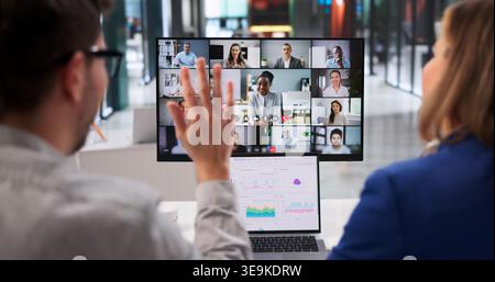 Virtual Business Meeting. Professionals Collaborating Via Laptop In Online Conference Session Stock Photo