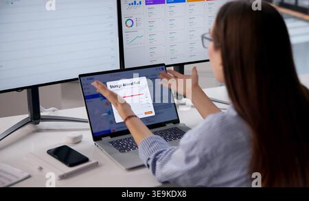 Woman Using Laptop Feels Stressed Facing Full Email Storage Problem. Stock Photo