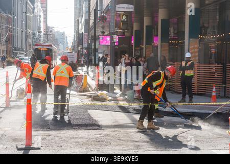 Toronto, Canada - April 17, 2026: Municipal workers in Toronto use various tools daily to keep streets clean and protect Stock Photo