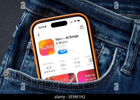 Antalya, Turkey - March 24, 2026: Smartphone in pocket displaying Suno AI music generation app Stock Photo