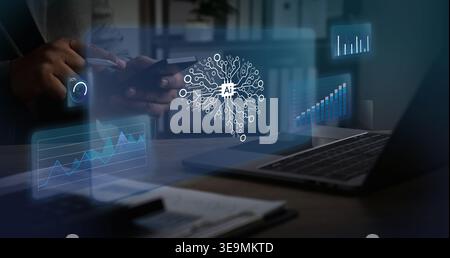 Hands performing data analysis using smartphone beside laptop displaying dashboard charts, supporting metrics tracking, reporting, and data management Stock Photo