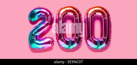 Rainbow foil balloon number, digit two hundred. Top view. Colored numeral on pink background. Stock Photo