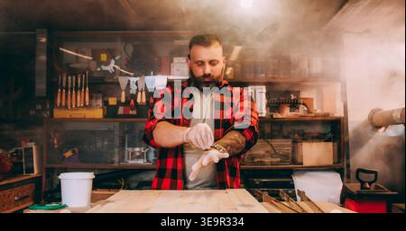 Joinery workshop industrial safety carpenter glove Stock Photo