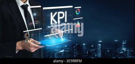 Business Professional Analyzing Key Performance Indicators Through Digital Interfaces and Technology in a Modern Cityscape at Night Sigmoid Stock Photo