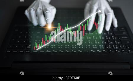 A robotic hand engages with stock market data on a laptop, emphasizing trends and analytics in a dynamic digital trading environment, symbolizing Stock Photo