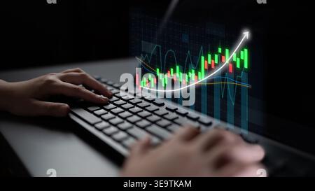 A dynamic scene featuring hands on a keyboard, analyzing stock market data through colorful graphs and charts, symbolizing investment strategies and Stock Photo