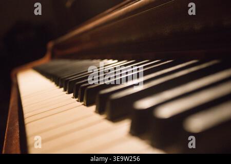 Piano in the dark Stock Photo