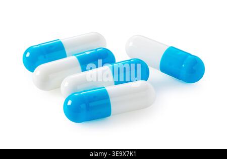 Pile of blue and white medical capsules isolated on white background, healthcare and pharmaceutical concept Stock Photo