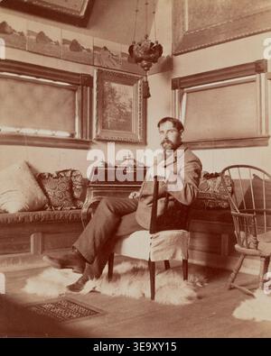 John Leslie Breck (1860–1899) was an American Impressionist painter known for introducing French Impressionism to the United States. The historical photographic print documents him in his studio around 1896. Stock Photo