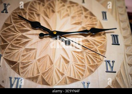 Two small suction hooks adhere to a tiled wall offering quick hanging points for towels or utensils. Their bright colors and simple shapes Stock Photo