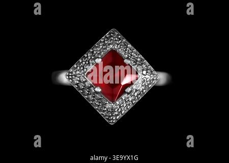 Elegant ruby ring closeup isolated on black background Stock Photo