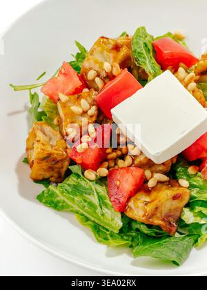salad with tomatoes, fried eggplant and feta cheese Stock Photo