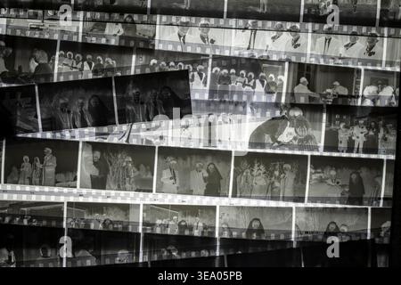 Collection of vintage black and white film negatives arranged in layers creating an abstract collage background concept for photography history memory Stock Photo