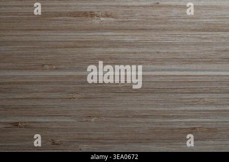 Close up of horizontal bamboo wood planks texture with natural grain and knots. High quality timber surface for interior design and backdrop. Natural Stock Photo