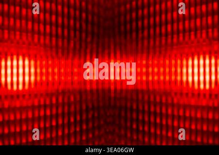 Futuristic abstract background with glowing red vertical light lines and grid pattern, blurred focus. Dynamic light effects for technology and digital Stock Photo