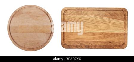 Set of wooden cutting boards isolated on white background. Round and rectangular kitchen boards with juice grooves, top view. Natural wood surface for Stock Photo