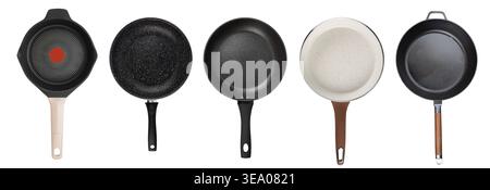 Set of five diverse non-stick frying pans from above. Features granite, marble, and ceramic coatings with black, brown, and beige handles. Modern high Stock Photo