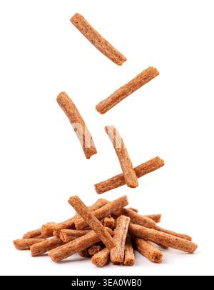 Rye croutons fall on heap close-up on a white background. Isolated Stock Photo