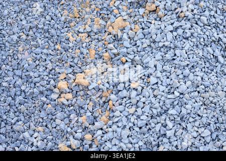 Gray granite gravel texture with sand, industrial background, top view. Industrial aggregate for durable road bases, drainage systems, and professiona Stock Photo