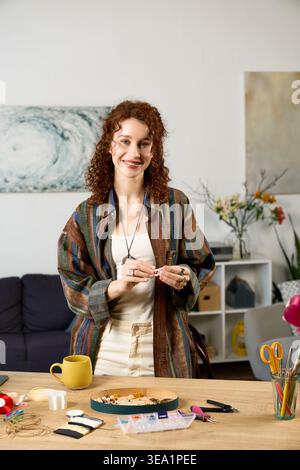 A talented woman crafts beautiful creations in her cozy, inspiring space. Stock Photo